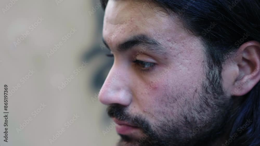 Young man deeply sad feeling lonely and isolated