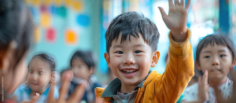 Smiling Boy Raises His Hand in a Classroom Smiling Boy Raises His Hand in a Classroom