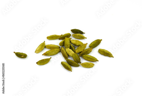 Pile of cardamom or cardamon seeds spice isolated on white background. Dried cardamom seeds isolated on white