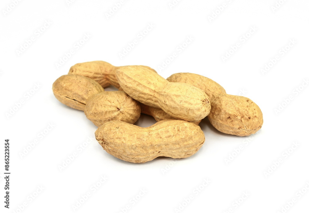 Organic peanuts in shell, isolated on white background. Raw peanuts on a white background. Unshelled peanuts. Organic peanuts in shell, isolated on white background. Raw peanuts on a white background. Unshelled peanuts.