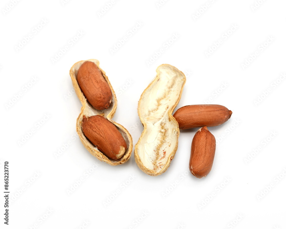 Organic peanuts in shell, isolated on white background. Raw peanuts on a white background. Unshelled peanuts. Organic peanuts in shell, isolated on white background. Raw peanuts on a white background. Unshelled peanuts.