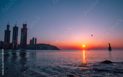 Landscape view of sunrise in  Haeundae beach, Busan, South Korea. photo