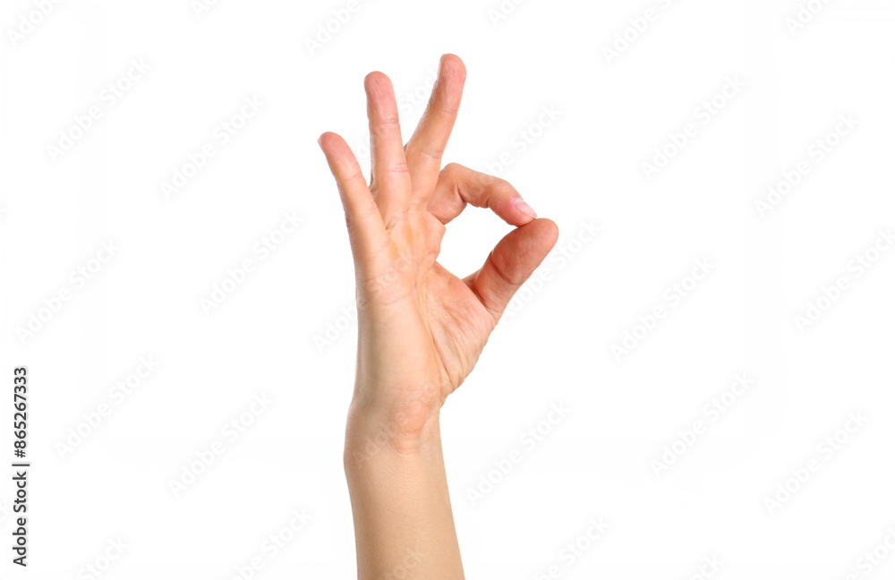 Male arm showing OK or confirm sign with thumb up closeup isolated on white background. High level and quality adviser offer and happy client Male arm showing OK or confirm sign with thumb up closeup isolated on white background. High level and quality adviser offer and happy client