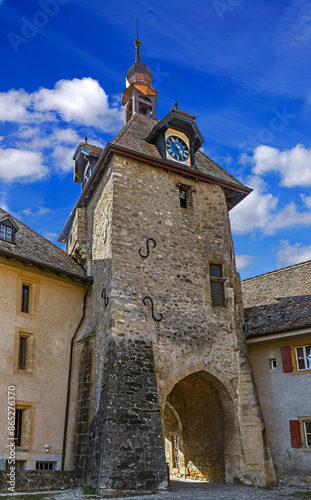 Abbacy entrance gate and tower. Village Romaimotier, Switzerland