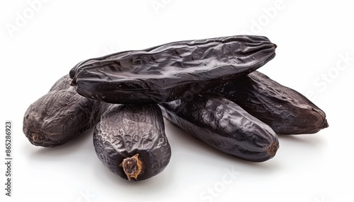 Wallpaper Mural Close up of isolated Tonka beans on white background Torontodigital.ca