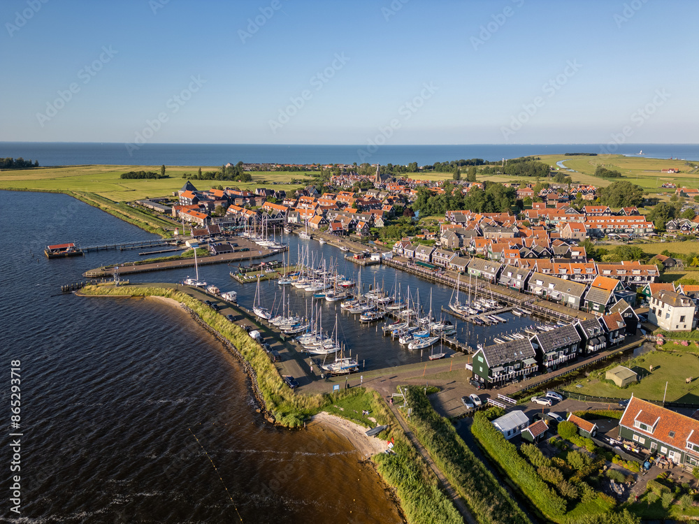 Fototapeta premium Aerial drone photo of the town and marina in Marken, an island in the Markermeer the Netherlands