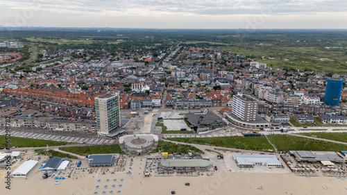 Aerial drone photo of the beach, boulevard and restaurants in the coastal town named Zandvoort in the Netherlands. 