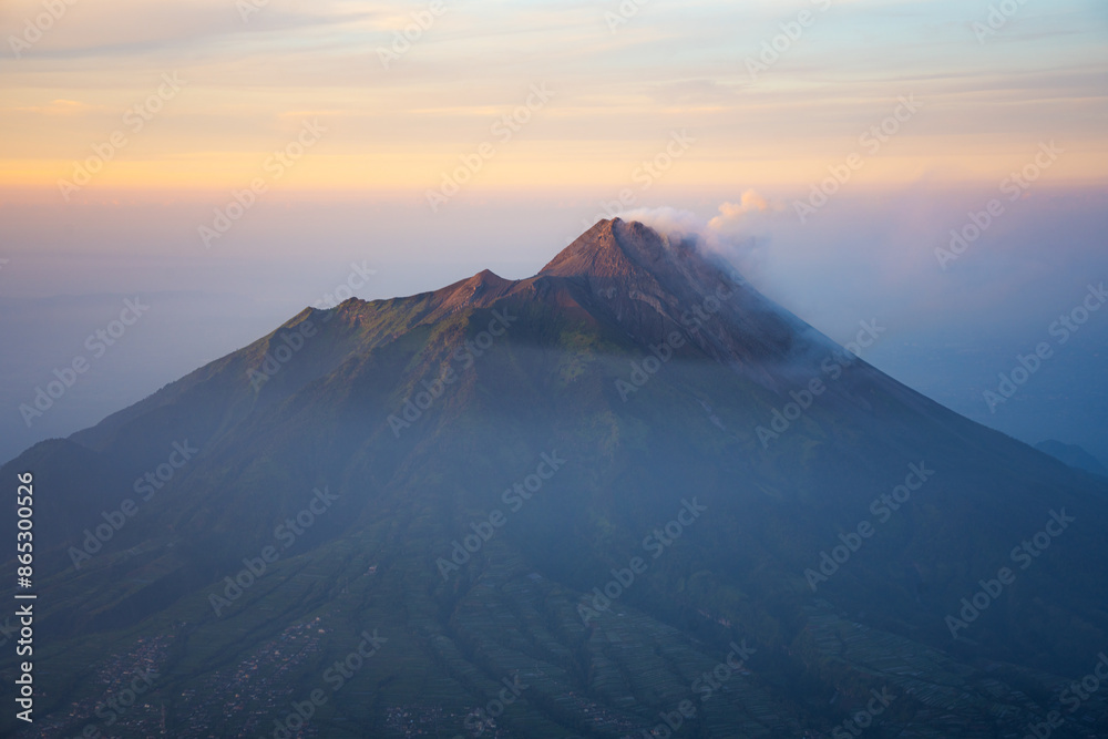 the magnificent Merapi Volcano in Java Island, Indonesia. Merapi Volcano is one of the most active volcano in the world. the magnificent Merapi Volcano in Java Island, Indonesia. Merapi Volcano is one of the most active volcano in the world.