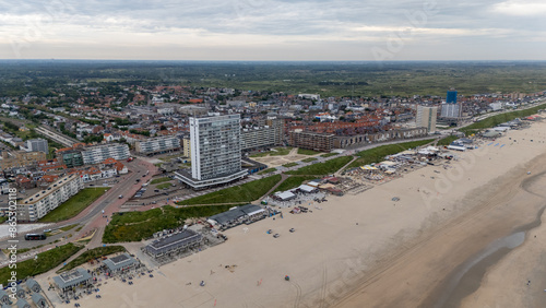 Aerial drone photo of the beach, boulevard and restaurants in the coastal town named Zandvoort in the Netherlands. 
