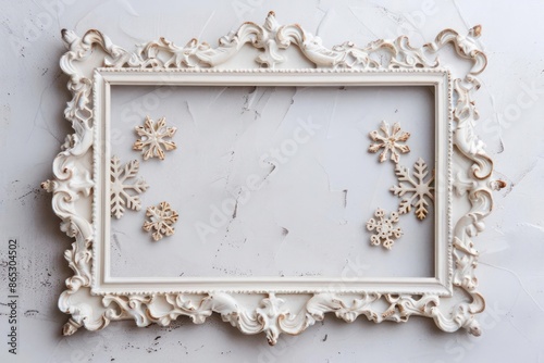 An antiquestyle frame featuring ornate snowflakes and festive ribbons, isolated with room for text on a clean backdrop photo