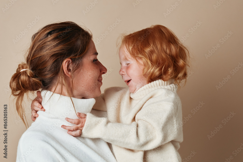 Mother and daughter smiling together on a sunny day in the park, family, love, happiness, outdoors, bonding, joyful moment Mother and daughter smiling together on a sunny day in the park, family, love, happiness, outdoors, bonding, joyful moment