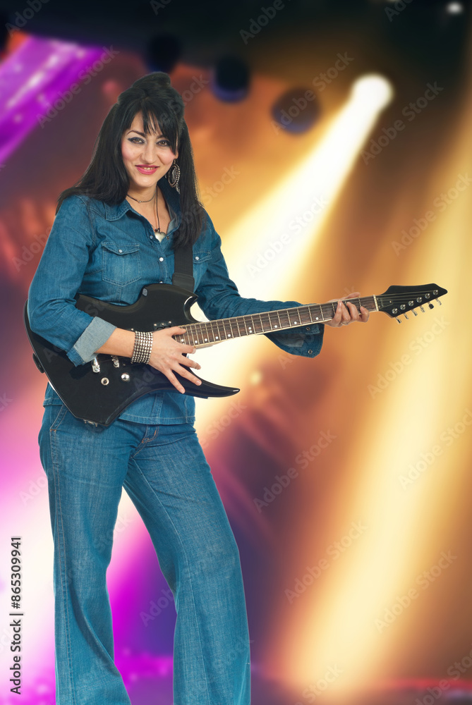 Fototapeta premium Woman Playing Guitar with Lights Background