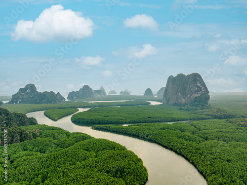 Obraz na płótnie View from above, aerial shot, stunning view of Ao Phang Nga (Phang Nga Bay) National Park featuring a multitude of limestone formations rising from the sea. Thailand. w salonie