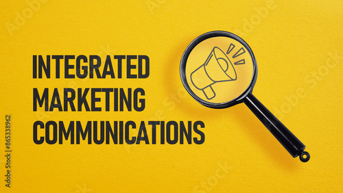 Integrated marketing communications IMC is shown on the business photo using the text