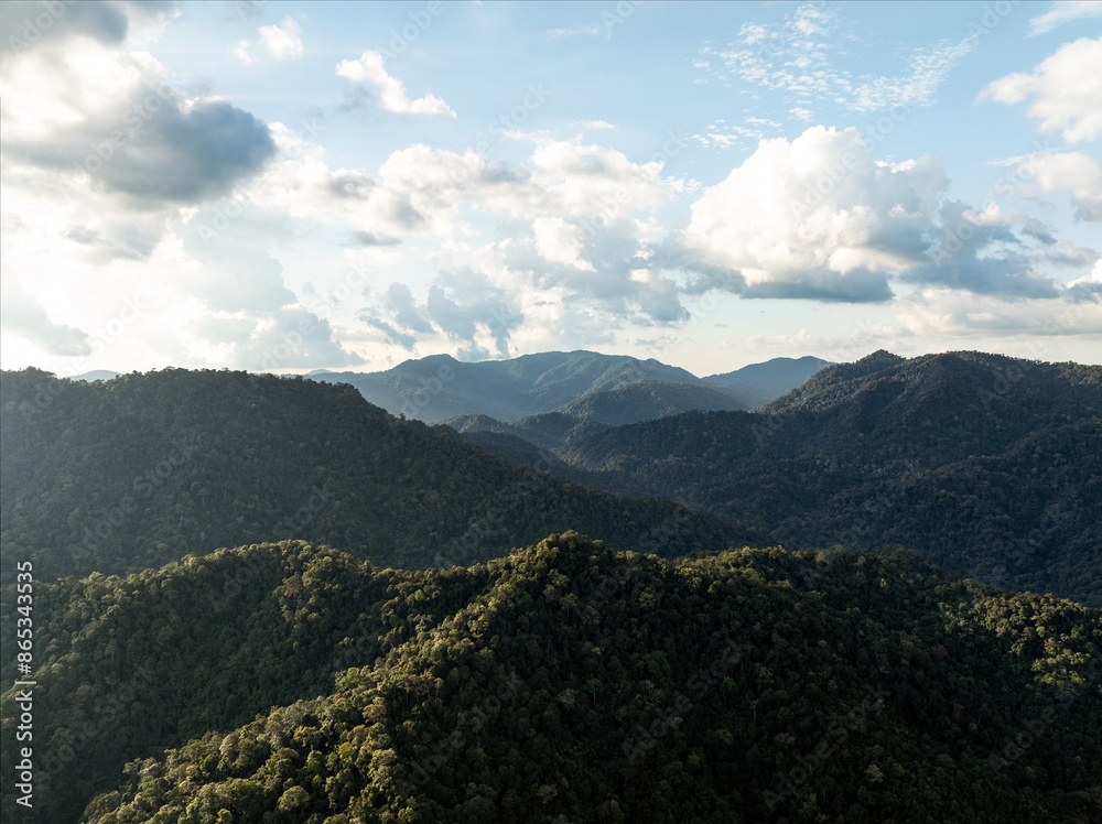 View from above, stunning aerial view of some limestone mountains during a cloudy day. Khao Sok National Park, Thailand.