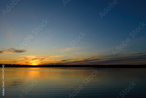 Attractive Colorful Sunset with Cloudy Sky. Peaceful Evening Scene Over Countryside. Stunning Sky with Dramatic Clouds. Beautiful Sunset Reflecting in Nature.