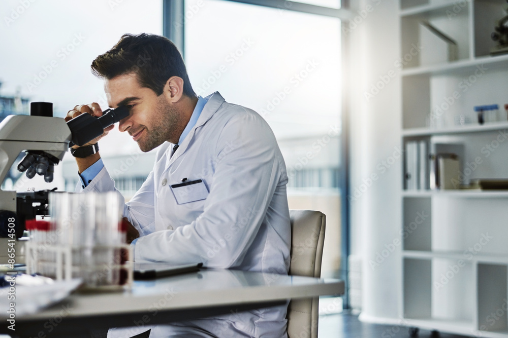 Lab, microscope and man with smile for science, cells and breakthrough for medicine in healthcare for virus. Digital, magnifying and particles for cure of disease in USA, scientist and development Lab, microscope and man with smile for science, cells and breakthrough for medicine in healthcare for virus. Digital, magnifying and particles for cure of disease in USA, scientist and development