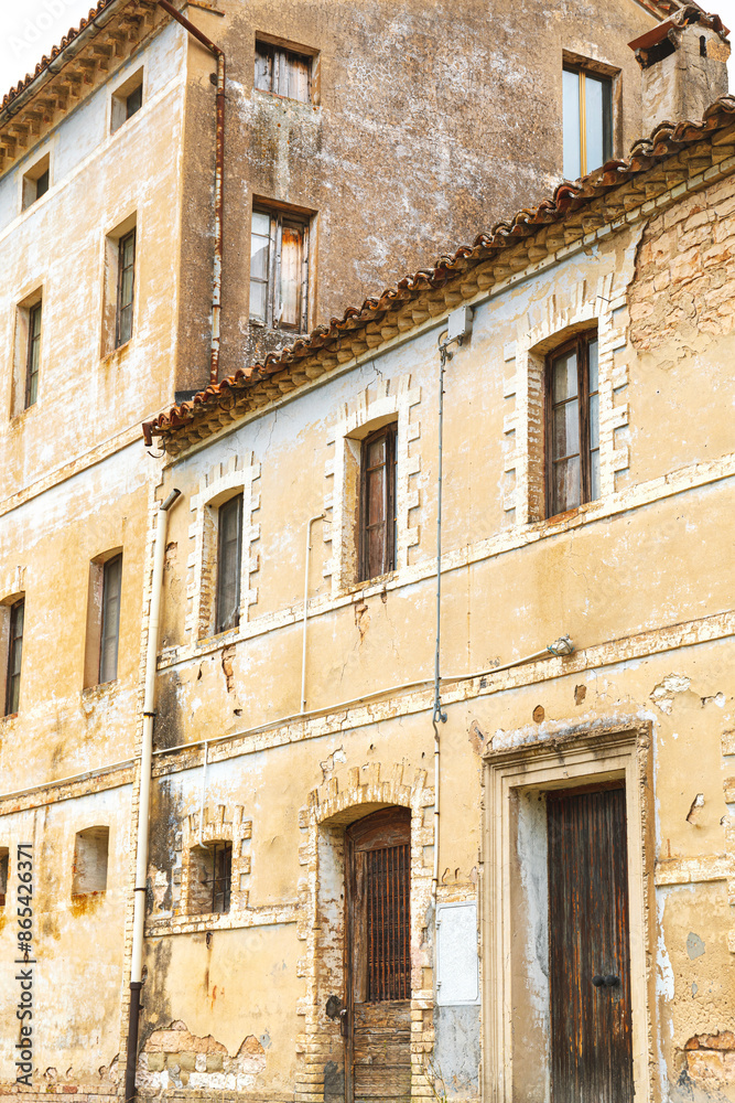 Facade of ancient dilapidated house Facade of ancient dilapidated house