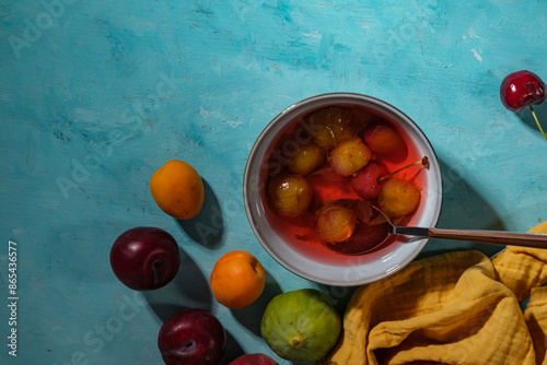 bowl of hosaf a turkish compote dessert of fresh fruits boiled in water with sugar photo