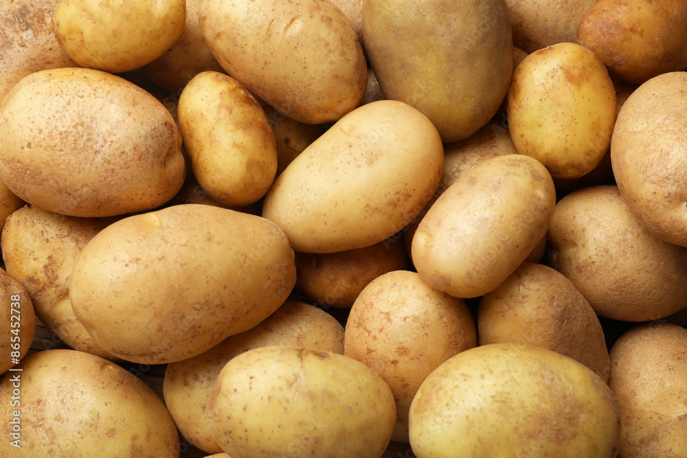 Many fresh potatoes as background, top view Many fresh potatoes as background, top view