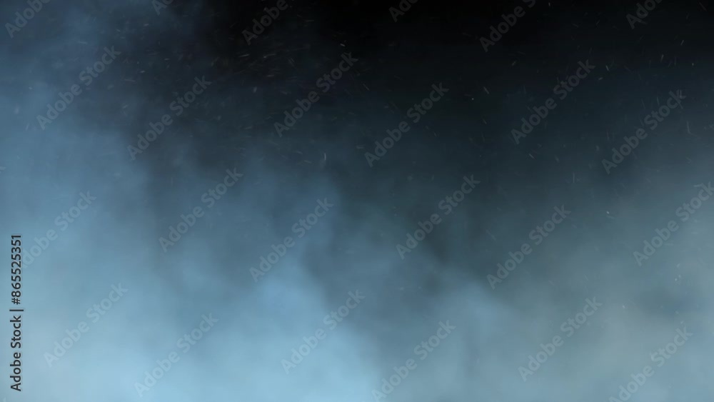 Blue Smoke and Ash Rolling 4K Loop features blue hued smoke and ash or snow rolling from left to right against a black background in a loop.
