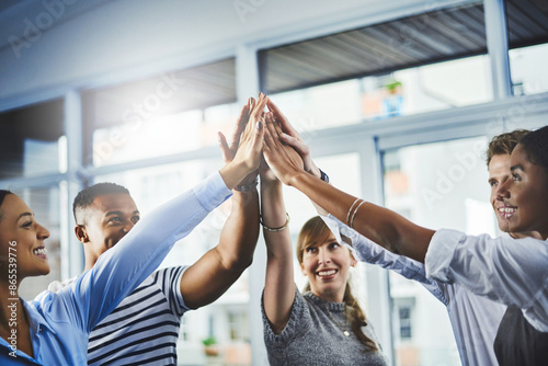 Фотография Cooperation, women and high five with man, office and agreement of merger of company and unity