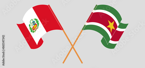 Crossed and waving flags of Peru and Suriname