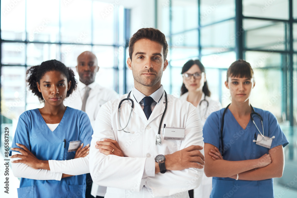 Portrait, people or proud doctors with arms crossed in hospital for healthcare services or about us. Leadership, medical professional or confident surgeon group with support at wellness clinic Portrait, people or proud doctors with arms crossed in hospital for healthcare services or about us. Leadership, medical professional or confident surgeon group with support at wellness clinic