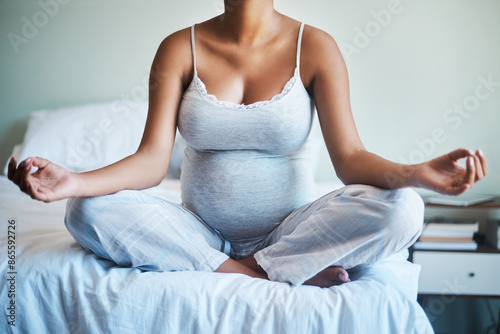 Pregnant woman, hands and meditation with bed for awareness, spiritual wellness or inner peace at home. Closeup of calm female person in relax, lotus pose or maternity for pregnancy or zen in bedroom