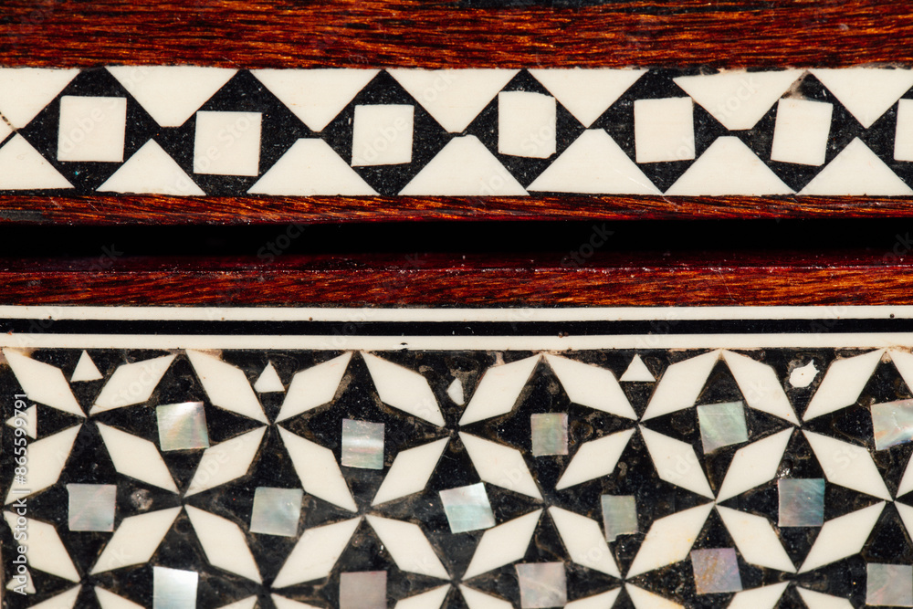 close up of wooden inlaid geometric mosaic box close up of wooden inlaid geometric mosaic box