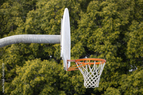 weathered basketball hoop and backboard up close