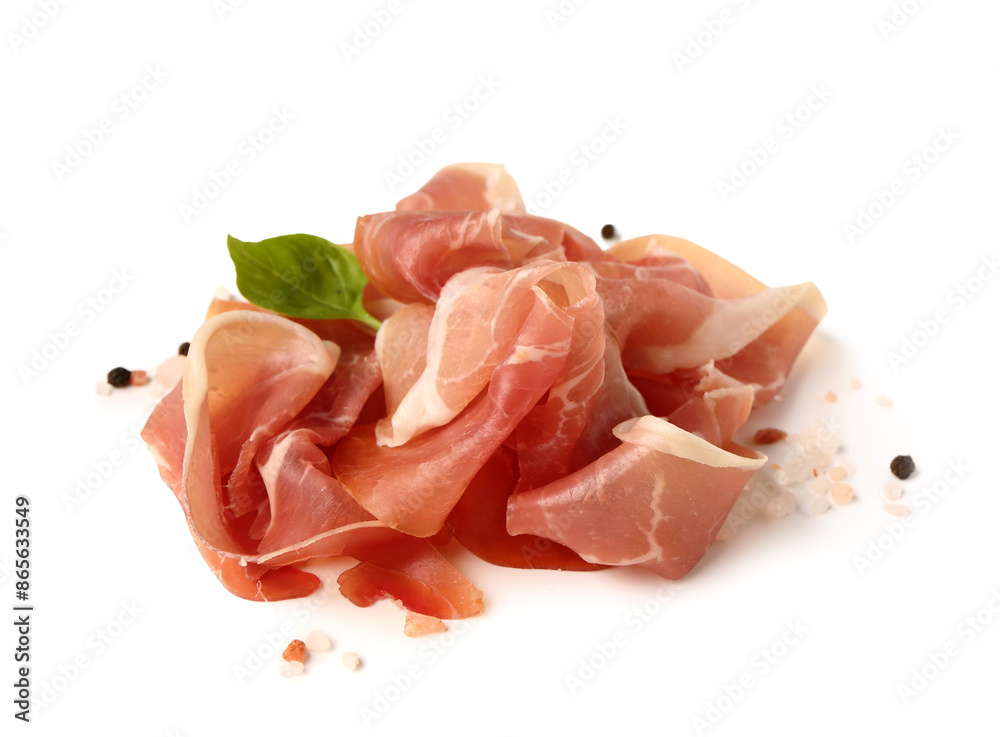 Slices of tasty prosciutto with basil on white background Slices of tasty prosciutto with basil on white background