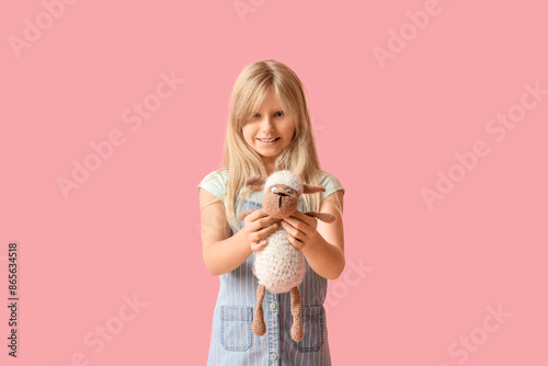 Cute little girl with plush...