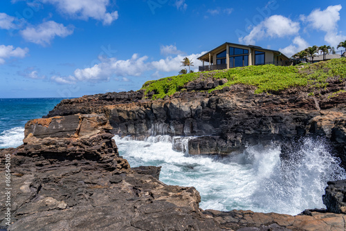 Waves hitting the Lava rock， Makahuena Light, Koloa, Kauai South Shore，Hawaii. Koloa Volcanics	，basalt photo