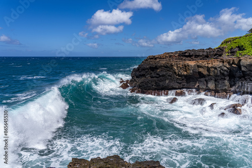 Waves hitting the Lava rock， Makahuena Light, Koloa, Kauai South Shore，Hawaii. Koloa Volcanics	，basalt photo