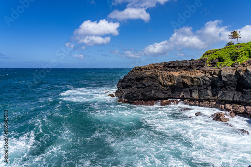 Waves hitting the Lava rock， Makahuena Light, Koloa, Kauai South Shore，Hawaii. Koloa Volcanics	，basalt photo