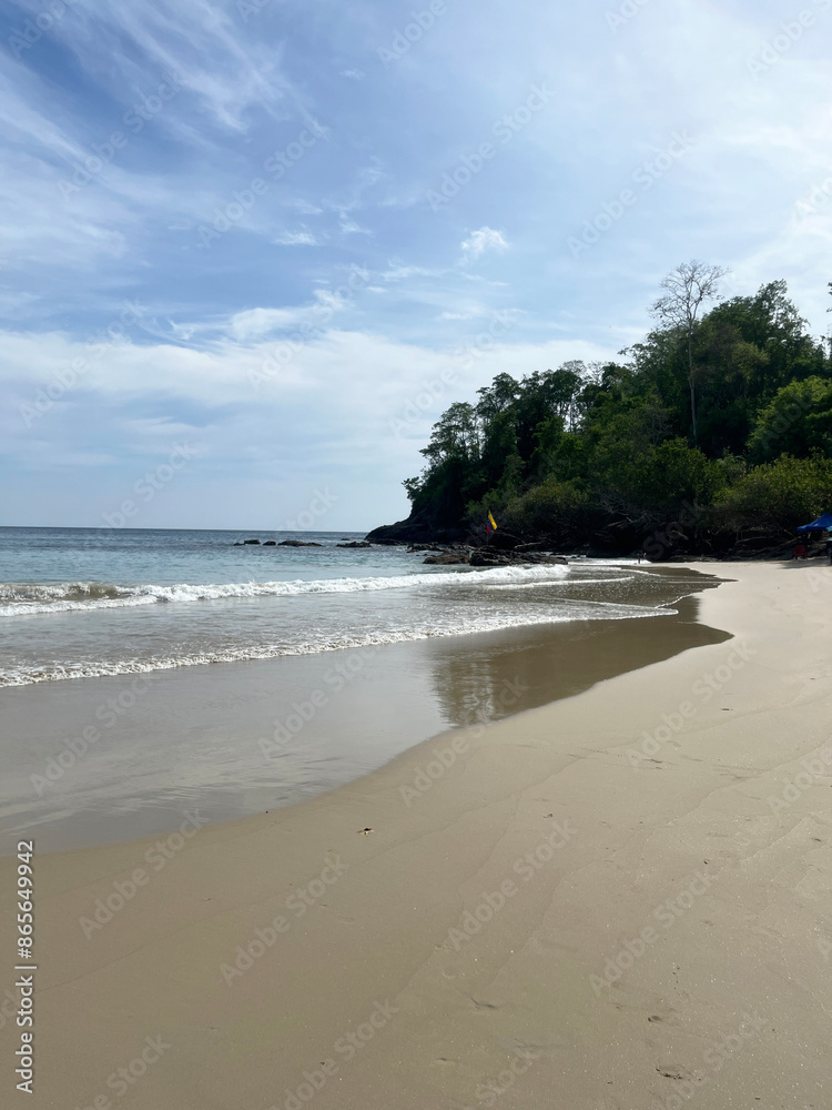 Beautiful beach with dreamy sky with different blues and large spaces of vegetation Beautiful beach with dreamy sky with different blues and large spaces of vegetation