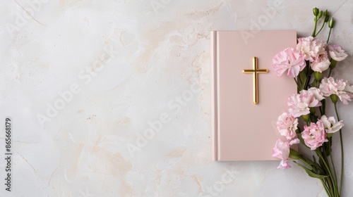 Sacred Bible, cross, and a bouquet of flowers arranged on a light background, plenty of room for text, creating a peaceful and divine atmosphere photo