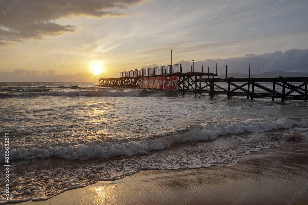 Sunrise on the sea, waves and sand, summer background. Sunrise on the sea, waves and sand, summer background.