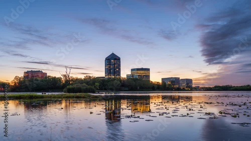 Bloomington, Illinois, USA skyline on Lake Normandale at dawn. photo