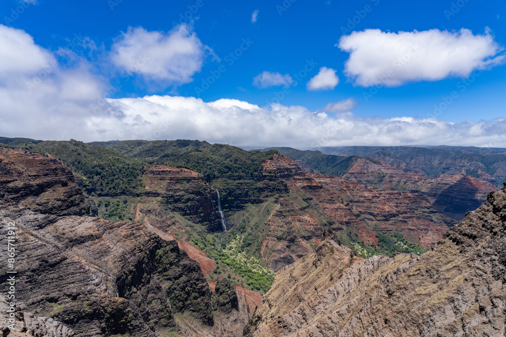 Waipo'o Falls, Waimea Canyon State Park, west Kauai, Hawaii. Waimea Canyon, also known as the Grand Canyon of the Pacific. Waipo'o Falls, Waimea Canyon State Park, west Kauai, Hawaii. Waimea Canyon, also known as the Grand Canyon of the Pacific.