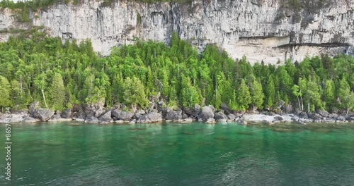 cliffside rocky beach with trees