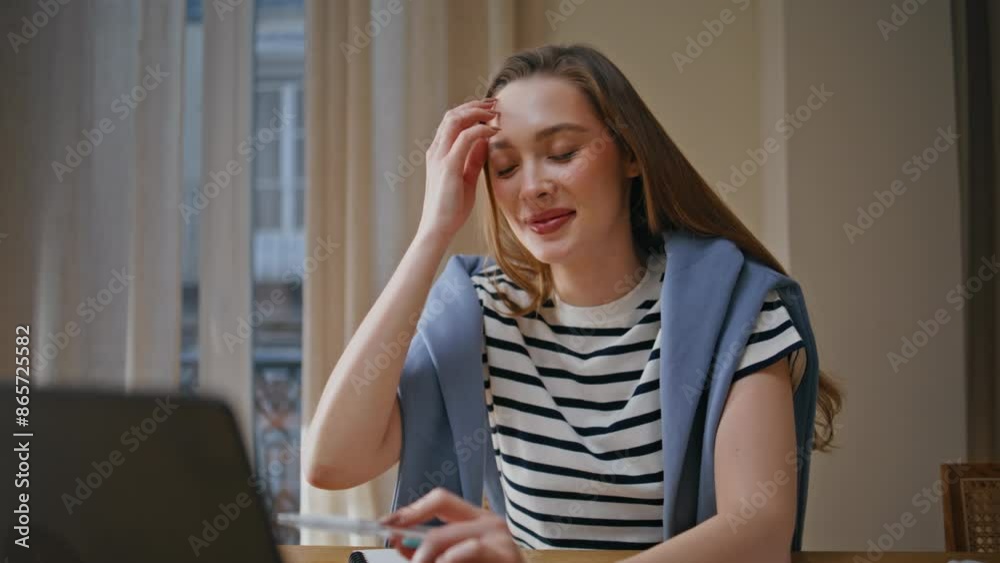 Smiling entrepreneur looking laptop screen sitting table remote office closeup. Smiling entrepreneur looking laptop screen sitting table remote office closeup.