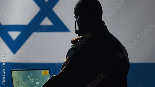 Israeli air defense operator using radar detecting missile attacks and conducting space surveillance and satellite tracking. Israel Mossad agent using military software preventing rockets, camera A