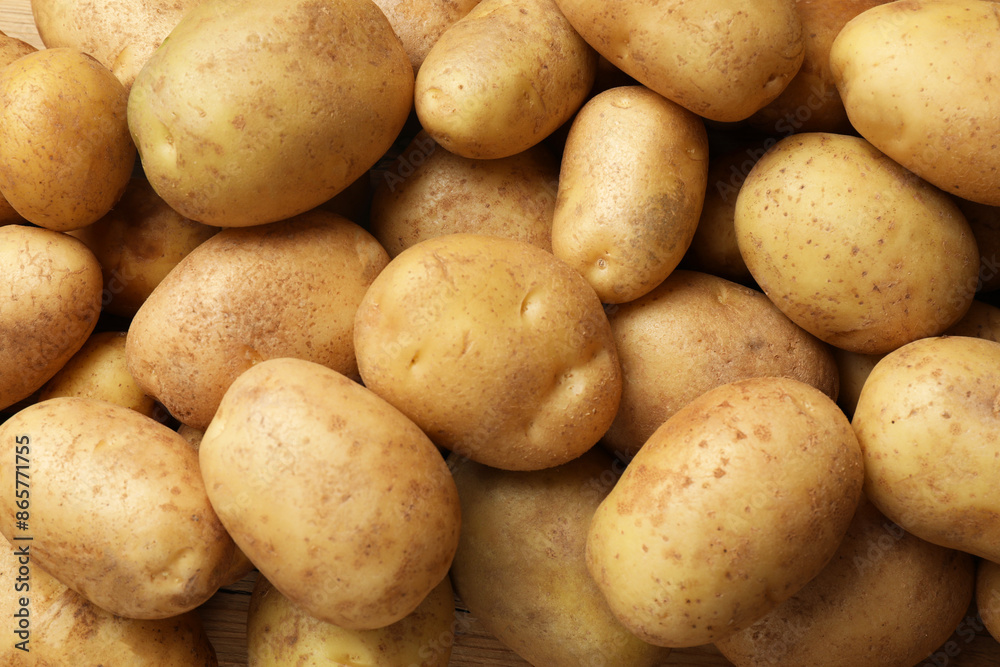 Many fresh potatoes as background, top view Many fresh potatoes as background, top view