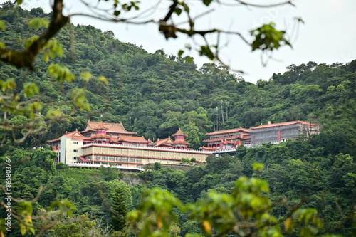 Nestled in Yilan's Dongshan Township by Meihua Lake, Sanching Temple's (道教總廟三清宮) grand and majestic architecture reflects Chinese classical elegance, harmonizing with serene natural surroundings. photo