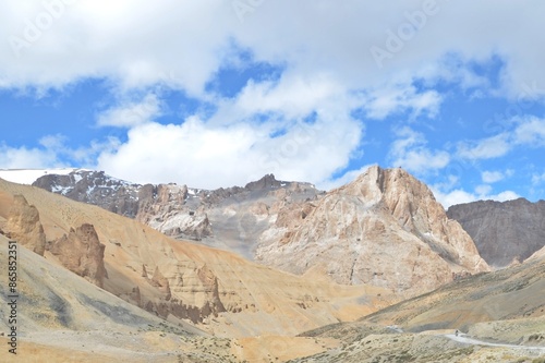 Leh Mountain Peaks Shrouded in Clouds under Clear Blue Sky