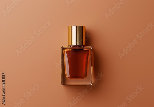 Glass Perfume Bottle With Gold Cap On Orange Background