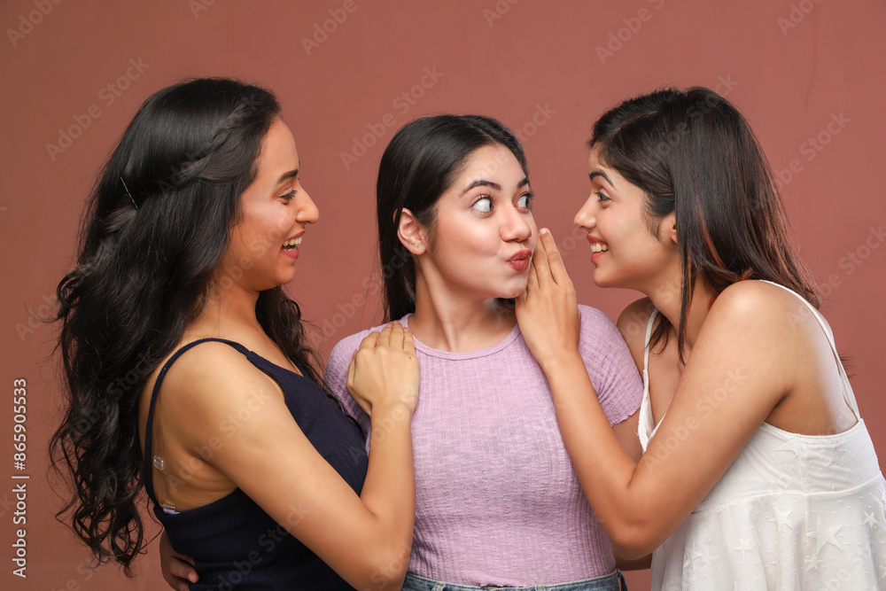 Three Surprised Women Are Standing And Looking At Each Other Three Surprised Women Are Standing And Looking At Each Other