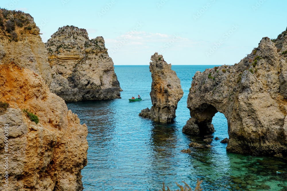Fototapeta premium Rocky clifs of Ponta da Piedade at Lagos, Portugal. Ocean beautiful landscape cliffs. Blue water